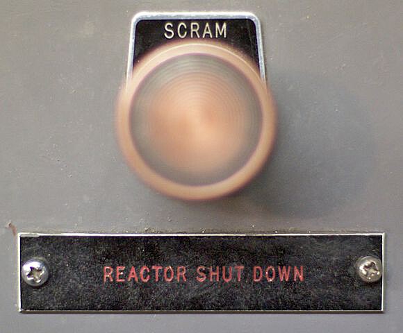 A scram switch (button), that could be
pressed to prevent inadvertent operation. Maybe the TMRC had buttons labeled `foo` instead