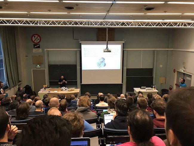 Me speaking at FOSDEM, 2019